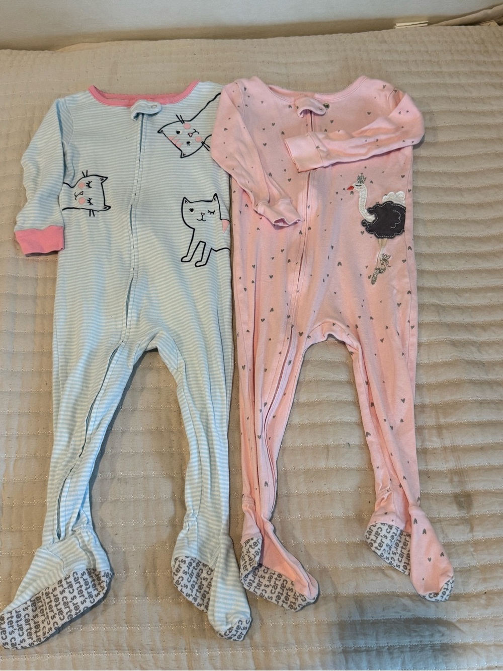 2 Carter’s sleep n play footed pajamas